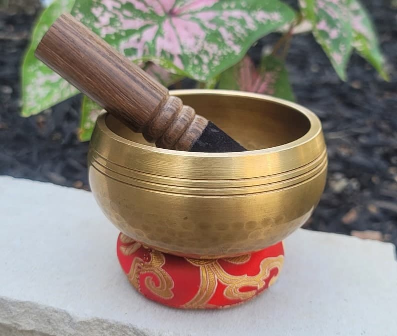 Tibetan singing bowls, like the one pictured, are a great gift idea for yoga teachers. 